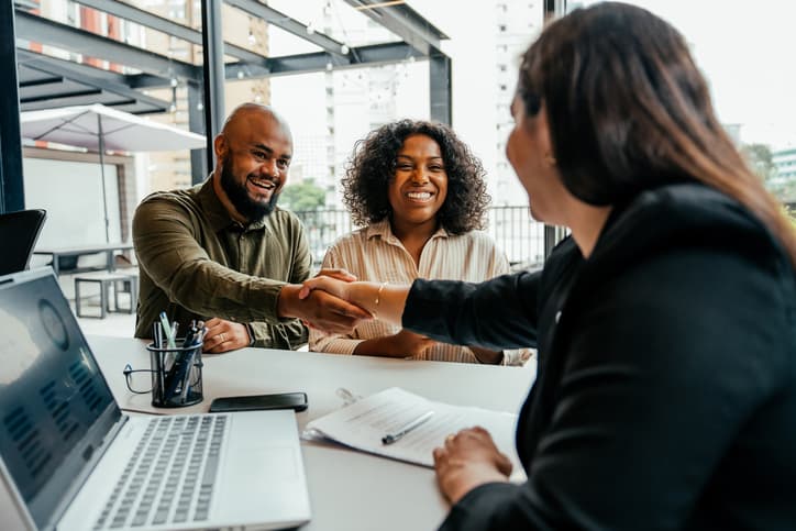 Happy business owner using upsurgy as their seo agency